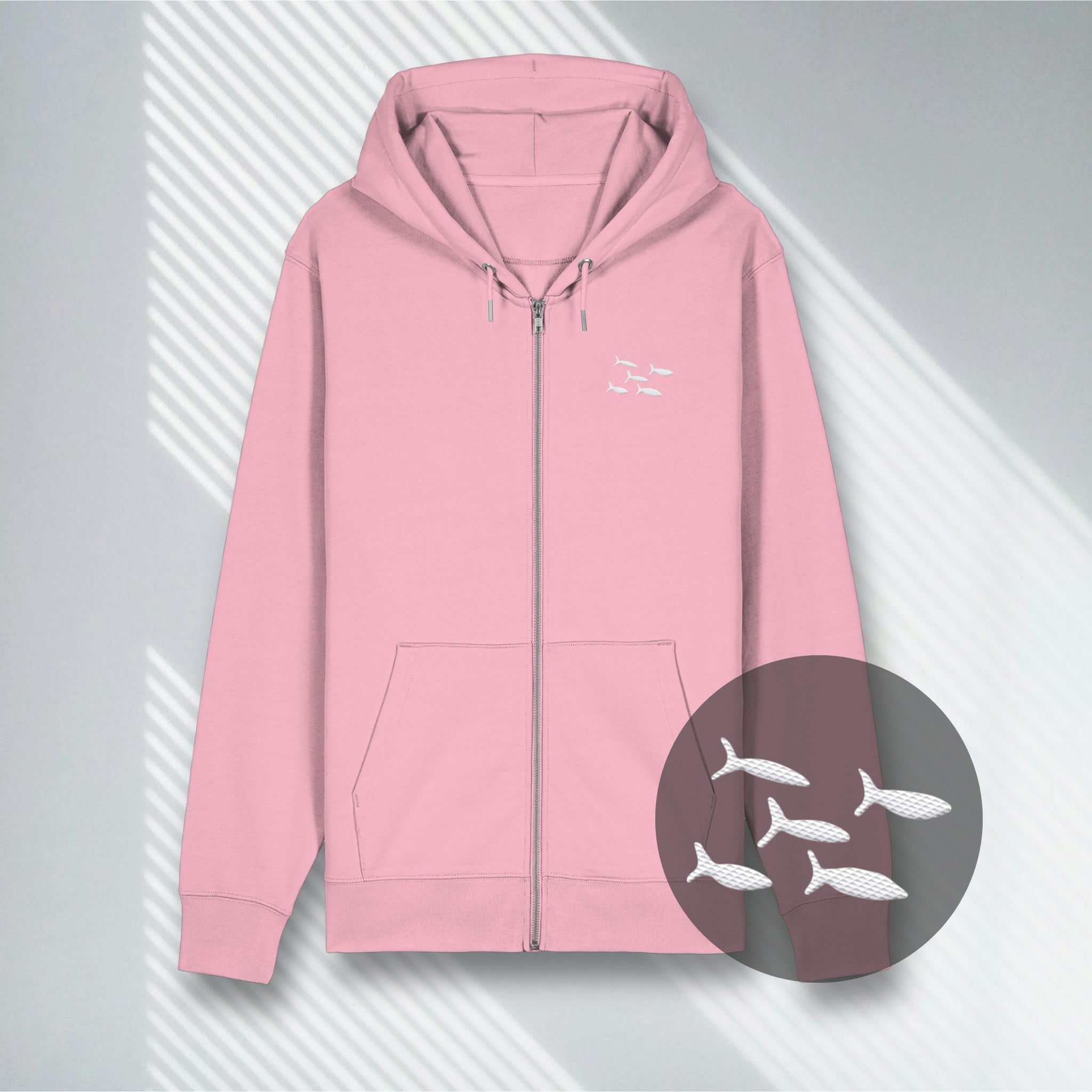 Rosafarbener 350g Heavyweight Zipper mit dezentem Fischschwarm-Stick für Ozean-Liebhaber.